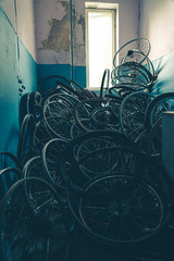 room full of bicycle wheels © Piotr Orłowski