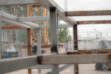 Fototapeta na wymiar Gray steel frame for making outdoor shelving in building construction area