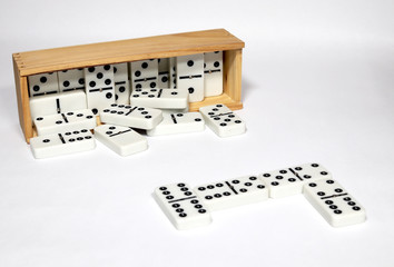 Dominoes in Wooden Box on white background