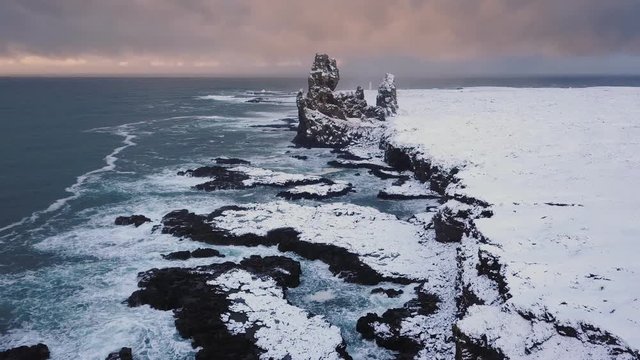 Aerial drone orbit at Londrangar cliffs, Snaefellsnes peninsula, Iceland 