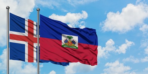 Iceland and Haiti flag waving in the wind against white cloudy blue sky together. Diplomacy concept, international relations.
