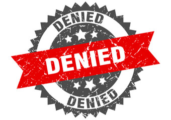 Obraz premium denied grunge stamp with red band. denied