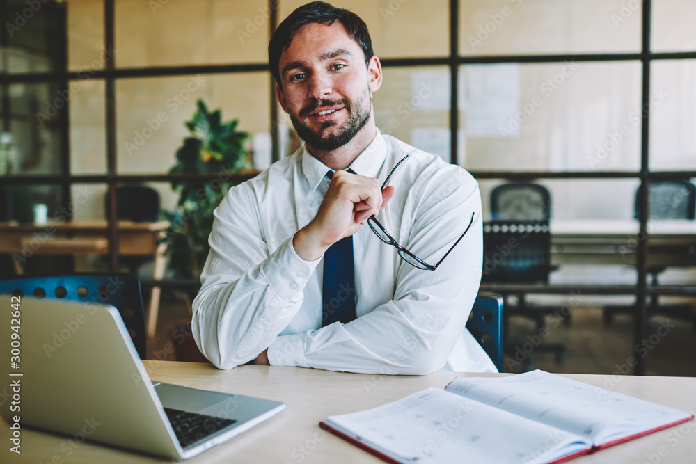 Aufkleber half length portrait of positive it professional dressed in elegant wear waiting for updating softwa
