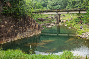 Fototapeta na wymiar old abandoned stone bridge