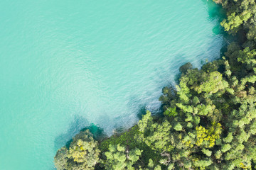 Sun Moon Lake in aerial with forest near the water