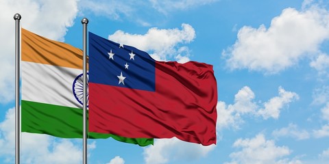 India and Samoa flag waving in the wind against white cloudy blue sky together. Diplomacy concept,...