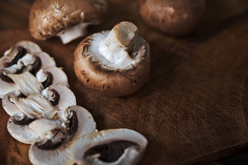 Close up of fresh mushrooms on wooden table