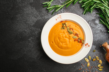pumpkin soup (first course, delicious vegetable vitamin food) menu concept. food background. copy...