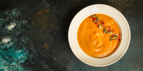 pumpkin soup (first course, delicious vegetable vitamin food) menu concept. food background. copy space. Top view