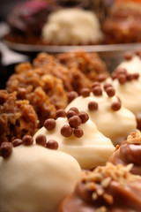 Sweet cookies, closeup of various kinds of cakes on event or wedding reception