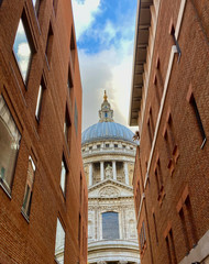 view of St Paul’s Cathedral from alley