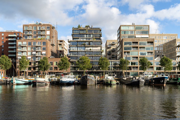 contemporary architecture at Westerdok Amsterdam. marina in front off the buildings, Westerdokseiland