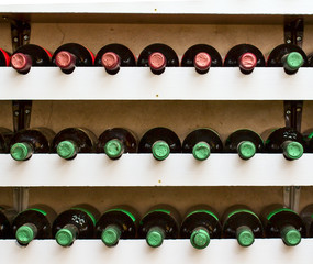 wine bottles on the wine cellar shelf