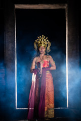Fototapeta premium Portrait of asian woman wear ancient thai dress style and makeup ghost face at the old castles at night scene,Thailand people