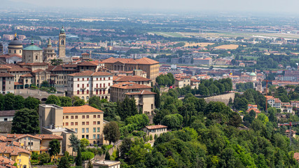 Beautiful buildings on the hills. Bergamo. Beautiful,  panoramic view. Journey to Italy. Green Summer Landscape.  © Dmitry Koshelev