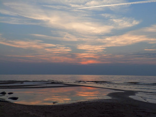 Obraz premium a gorgeous sunset by the sea