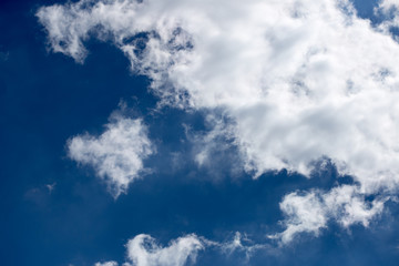 Beautiful blue sky with white clouds nature background. Cloudscape in light day