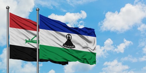 Iraq and Lesotho flag waving in the wind against white cloudy blue sky together. Diplomacy concept,...