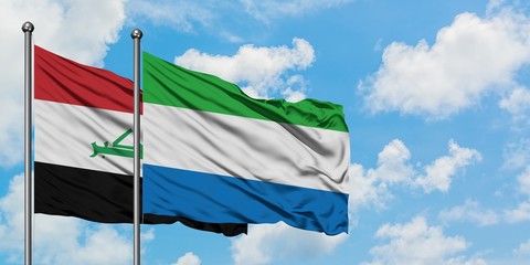 Iraq and Sierra Leone flag waving in the wind against white cloudy blue sky together. Diplomacy concept, international relations.