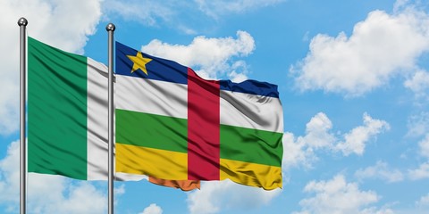 Ireland and Central African Republic flag waving in the wind against white cloudy blue sky together. Diplomacy concept, international relations.