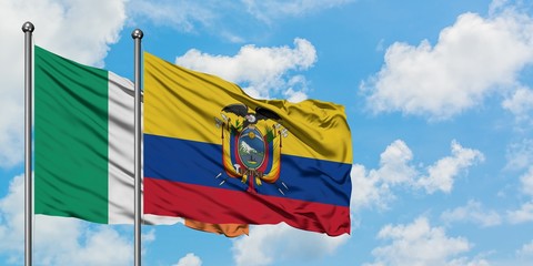 Ireland and Ecuador flag waving in the wind against white cloudy blue sky together. Diplomacy...