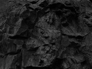 Black stone background. Dark gray rock texture. Mountain close-up. Abstract grunge stone...