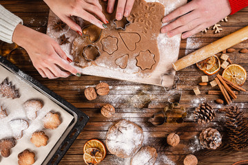 Christmas traditional pastries. Friends make Christmas holiday homemade cookie dough. Top view.