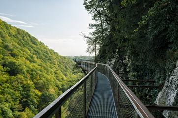 suspension metal bridge in canyon in Georgia