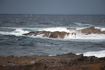 waves over rock