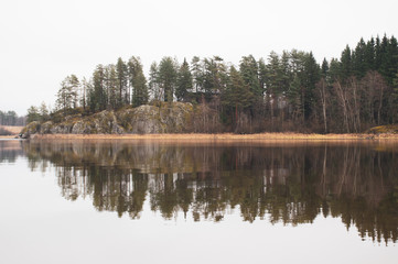 Fototapeta na wymiar lake in the forest and reflection