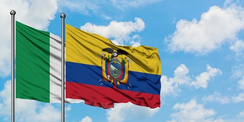 Italy and Ecuador flag waving in the wind against white cloudy blue sky together. Diplomacy concept, international relations.