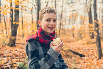 portrait of child in the autumn season outside