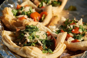 pita bread with vegetables on a tray