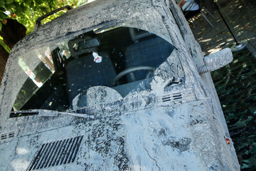 The detail of a car dirty from mud after the offroad race. It needs to be cleaned. 