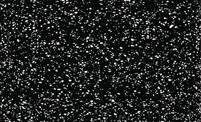 Small uneven spots and particles of debris. Abstract vector texture.  Distressed uneven background. Grunge texture overlay with fine grains isolated on white background. Vector illustration. EPS10.