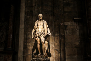 The interesting statue in Milan Cathedral. The monk looks poor but well body shaped and also a bit like the zombie.