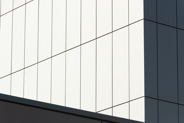 Geometric color elements of the building facade with planes, lines, corners with highlights and...