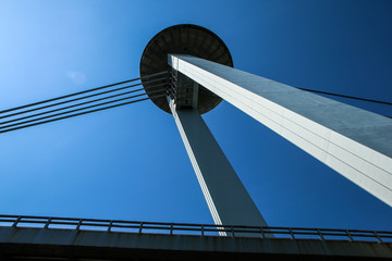 The detail of the SNP brisge in Bratislava in Slovakia. The UFO observation deck on the bridge is...