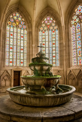 HEILIGENKREUZ, VIENNA, AUSTRIA - AUG 9 2019: Fountain in the cloister of Heiligenkreuz Abbey a...