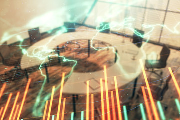 Double exposure of stock market graph with globe hologram on conference room background. Concept of international finance