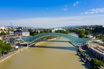 Bridge of Peace in Tbilisi, Geaorgia, bow-shaped pedestrian bridge over the Kura River in Tbilisi, capital of Georgia. One of the most important sites of Tbilisi