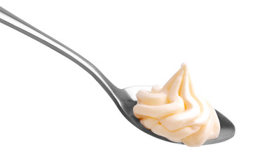 white cream in a spoon