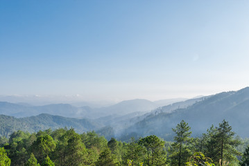 green forest blue ridge mountains smoky mountain landscape background layered hills and valleys 