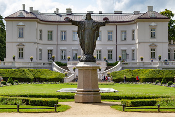 Palace in the park. Landscaped garden. Palanga. The sculpture of Blessed Christ. Lake in the old...