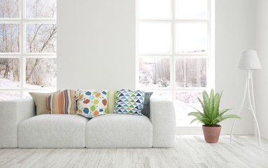 Stylish room in white color with sofa and winter landscape in window. Scandinavian interior design. 3D illustration