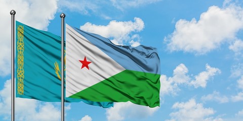 Kazakhstan and Djibouti flag waving in the wind against white cloudy blue sky together. Diplomacy...