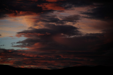 Fototapeta na wymiar Storm clouds in the light of dawn on a dawn of early spring days. Vitoria-Gasteiz (Alava) Basque Country, Spain