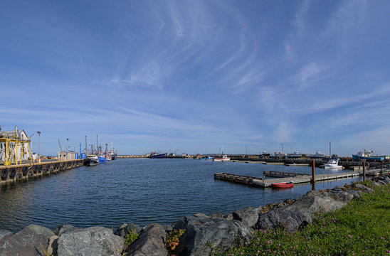 Fishing boats tied up at a wharf