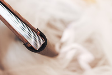 Leather binding of a wooden photo book. Leather binding photo book made of wood. Note book with...