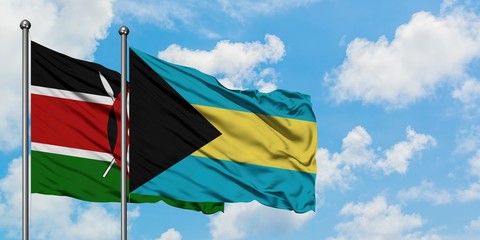 Kenya and Bahamas flag waving in the wind against white cloudy blue sky together. Diplomacy concept, international relations.